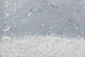 Background from white sea salt. Coarse rock salt texture witth copy space