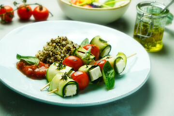 Zucchini skewers with feta and quinoa