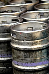 Fototapeta premium Large group of steel metal beer, lager or ale barrels, casks or vats
