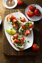 Homemade strawberry bruschetta with green pea