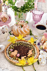Traditional Polish Easter cake mazurek and ring cake on festive table