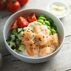 Homemade rice bowl with shrimps and vegetables