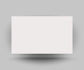 Blank white horizontal paper poster mock up on grey wall background