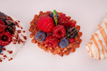 Fresh cake with raspberries in powdered sugar. Dessert in a cafe for breakfast.