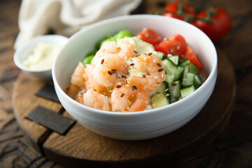 Homemade rice bowl with shrimps and vegetables