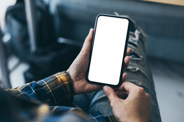 cell phone blank white screen mockup.hand holding texting using mobile on desk at office.background empty space for advertise.work people contact marketing business,technology