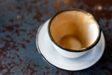 empty coffee cup shallow depth of field