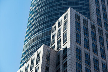 Obraz premium Modern building facade. Rounded modern office building.