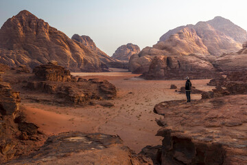 Trekking in Wadi Rum desert, Jordan - obrazy, fototapety, plakaty