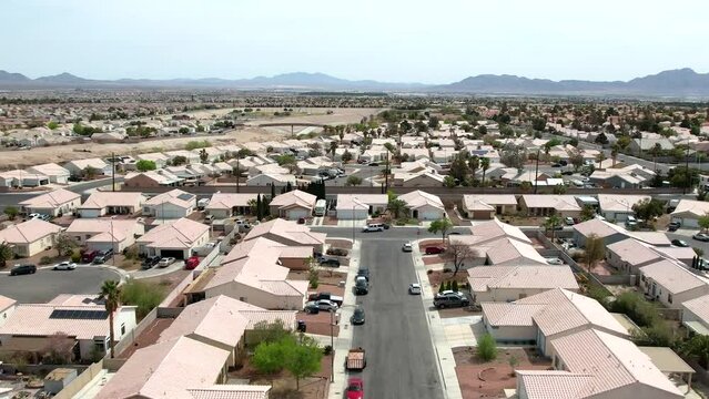 Aerial view of Las Vegas suburban neighborhood houses, Desert in background