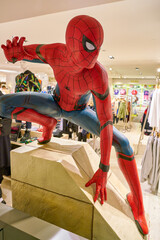 Fototapeta premium MILAN, ITALY - CIRCA NOVEMBER, 2017: life-sized figure of Spider-Man at Rinascente shopping center in Milan.