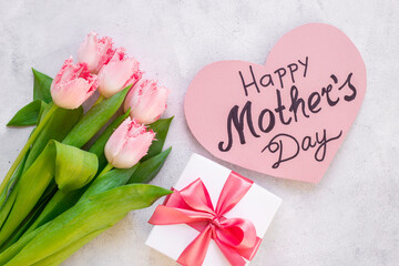 Obraz na płótnie Canvas Happy Mothers day greeting card with tulip flowers