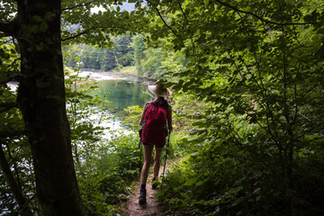 Fototapeta premium Mid Adult Woman Hiker Exploring Wild nature in Slovenia