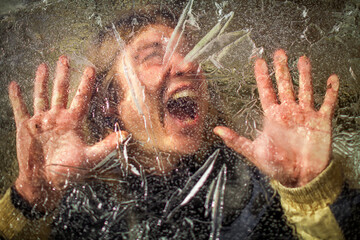 Young Adult Man Screaming Trapped under ice conceptual Image
