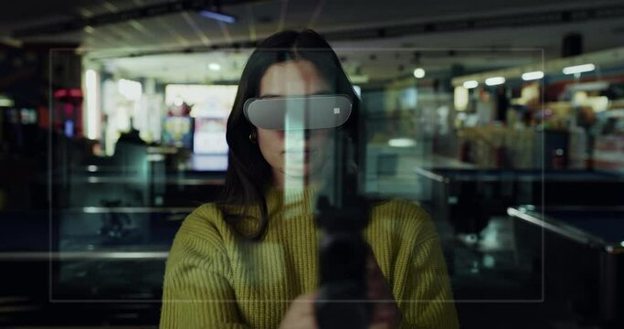 Cinematic shot of young woman using innovative futuristic technology vr glasses with augmented reality holograms to play shooting simulation video game with infrared gun in amusement park on weekend.