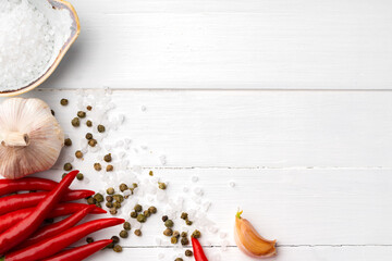 Flat lay composition with chili peppers and spices