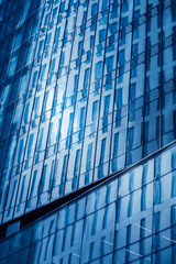 Modern building facade. Light reflection in modern office building.
