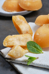 Several palm sugar cakes made from palm tree sap. Shallow depth of field