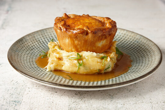close up of a gourmet pie and mash.