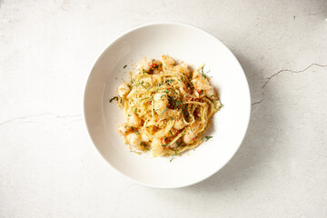 Italian gourmet prawn pasta in bowl