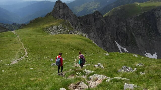 mother with daughters hiking by the Fagaras ridge