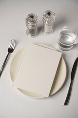 Table setting with plate, knife and fork, top view