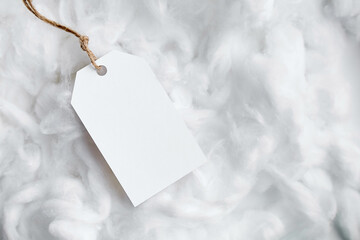 Label tag mockup and white cotton background