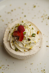 Strawberry pavlova cake, meringue nest dessert