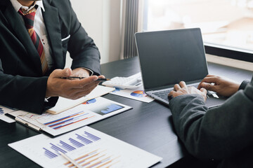 Financial business consulting meeting, market growth analysis, business investment strategy planning.