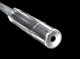 Shiny suppressor on a dark background
