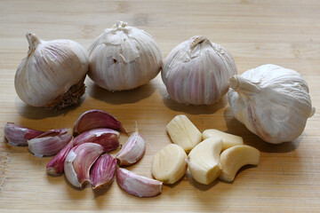 Garlic bulb and garlic cloves, cooking ingredients for many mediterranean dishes 