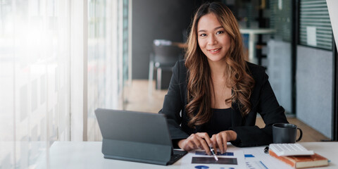 A successful entrepreneur analyzing a technical price graph and indicator. The concept of a bank account, a savings account, or an insurance policy.