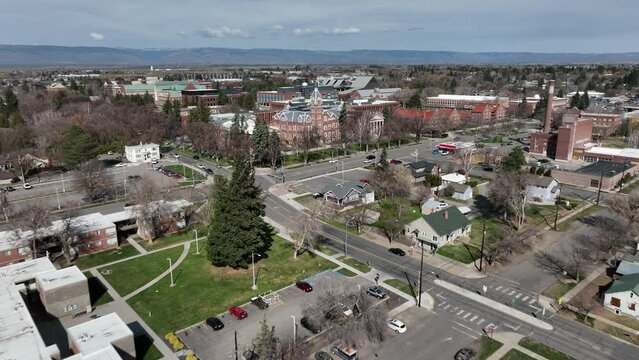 Cinematic 4K aerial drone dolly in shot of Central Washington University located in the city of Ellensburg, Kittitas County in Western Washington