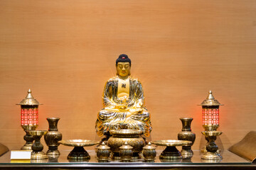 Golden Buddha statue on the altar