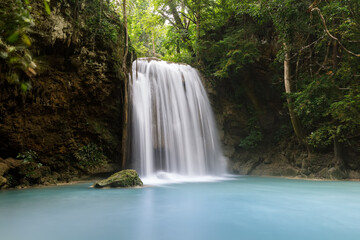 Fototapeta na wymiar Erawan Waterfall,beautiful waterfall deep forest in Thailand