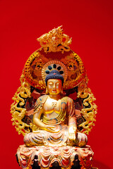 Fototapeta premium Close up of a golden Buddha statue