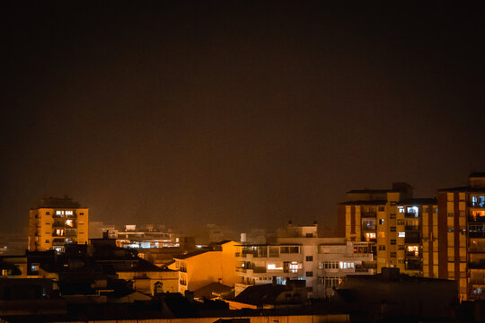 Night skyline of Fuengirola while Calima is on 