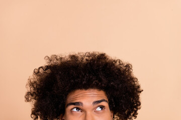 Cropped view portrait of attractive funky cunning curious guy with chevelure guessing isolated over...