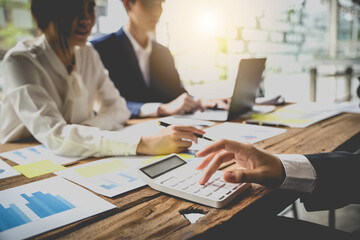 Fototapeta premium Start up Business, a team of young entrepreneurs working together to increase profits into the company to increase business potential.