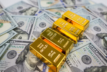gold bars on dollars.
