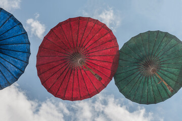 Paper Umbrella alley with blue sky in the background.