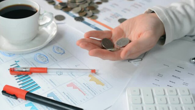 Coins fall on your hand, hs stock footage