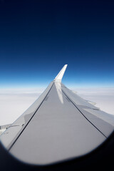 Airplane wing in the sky