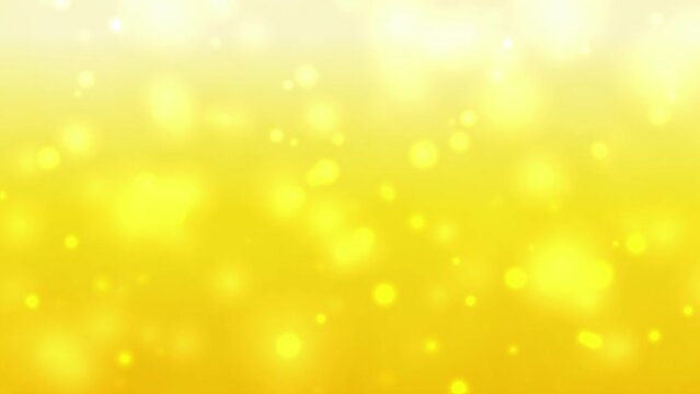 Shiny particles float on a 4K gradational gold background. 