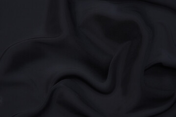 Close-up texture of natural gray or black fabric or cloth in same color. Fabric texture of natural...