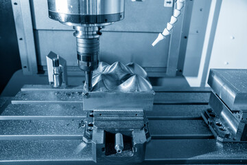 The CNC milling machine rough cutting the injection mold parts by indexable tools.