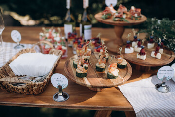 buffet, catering, various canapes and salads in a glass