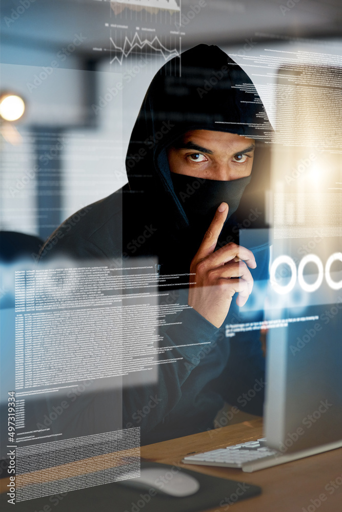 Aufkleber You wont even notice its gone. Portrait of a serious computer hacker hacking into a computer in an office.