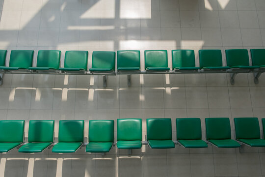 Green chairs are in line from top view.