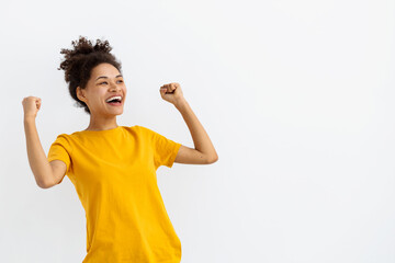 Portrait of excited young African American woman have good mood feel happy excited emotion on a...